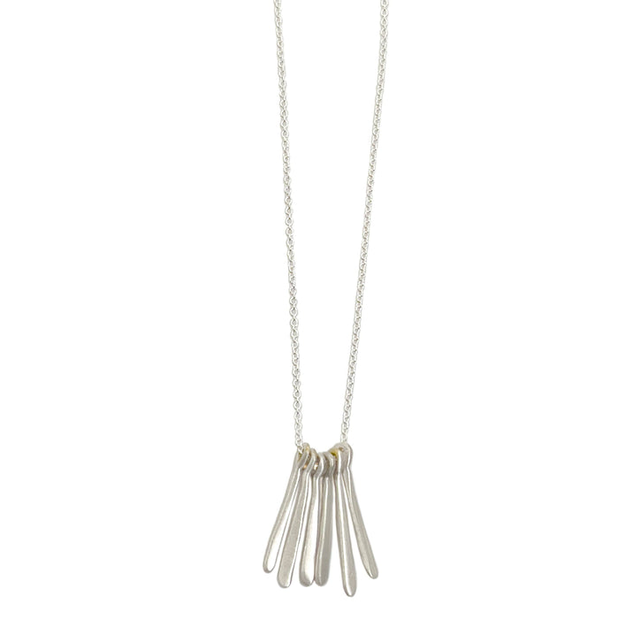 Six small needles. necklace: Vermeil