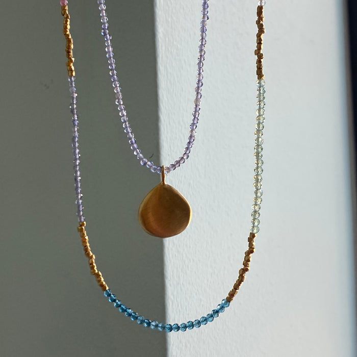 smooth puffy drop on iolite necklace