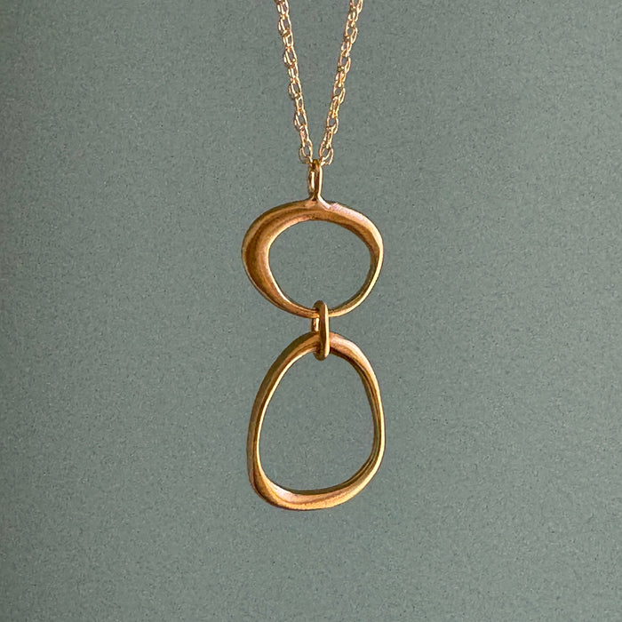 Large and small organic circles necklace: Gold