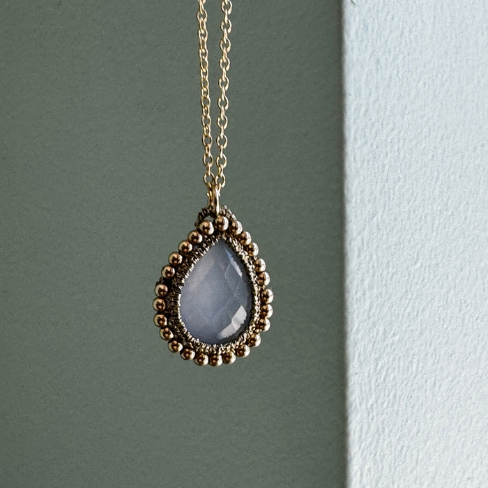 Chalcedony Teardrop with Golden Orbit