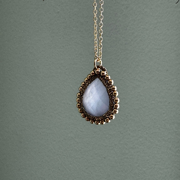 Chalcedony Teardrop with Golden Orbit