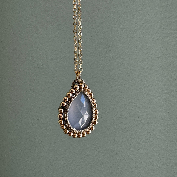 Chalcedony Teardrop with Golden Orbit