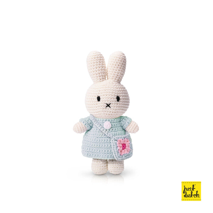 Miffy and her flower bag: Pastel yellow dress with blue flower bag