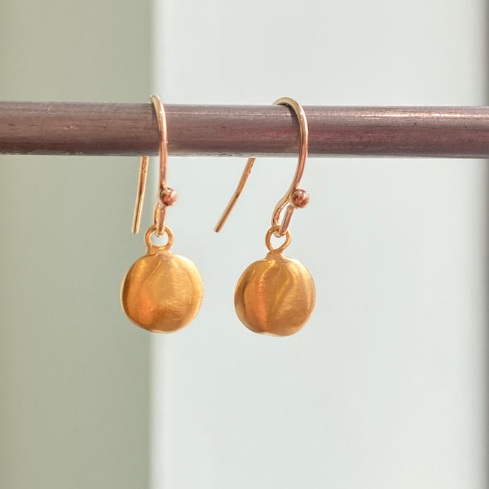 tiny disc earrings, gold