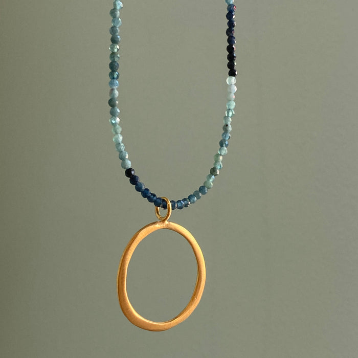 Open Circle on Blue Tourmaline Strand