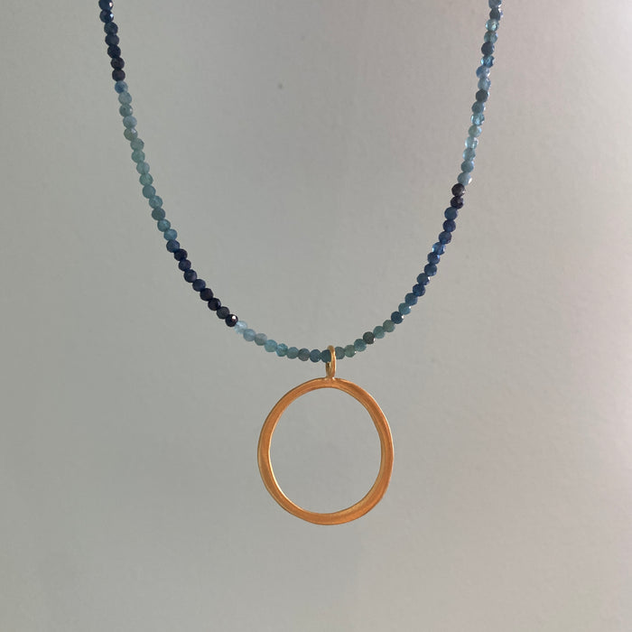 Open Circle on Blue Tourmaline Strand