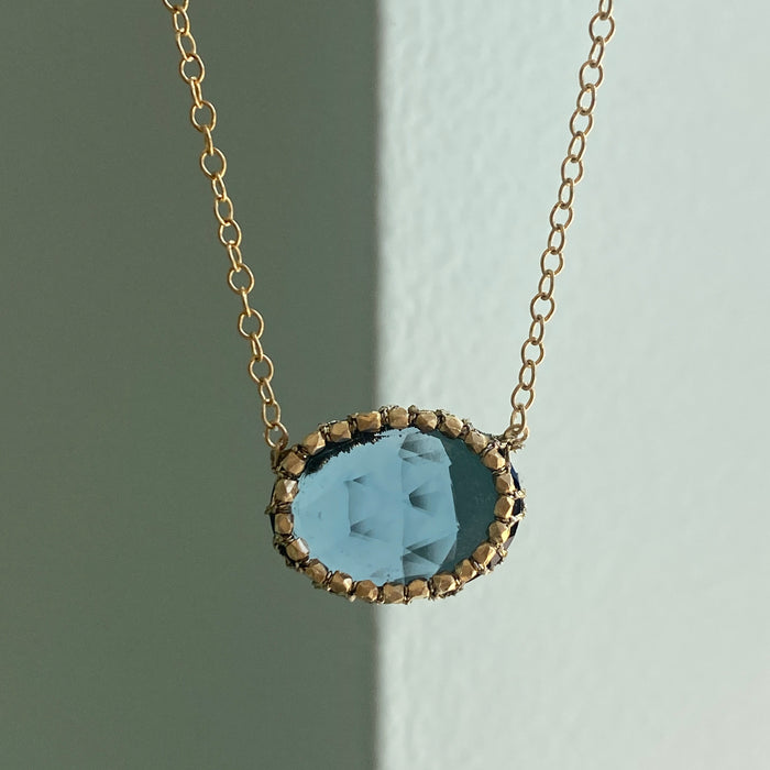 Caged London Blue Oval